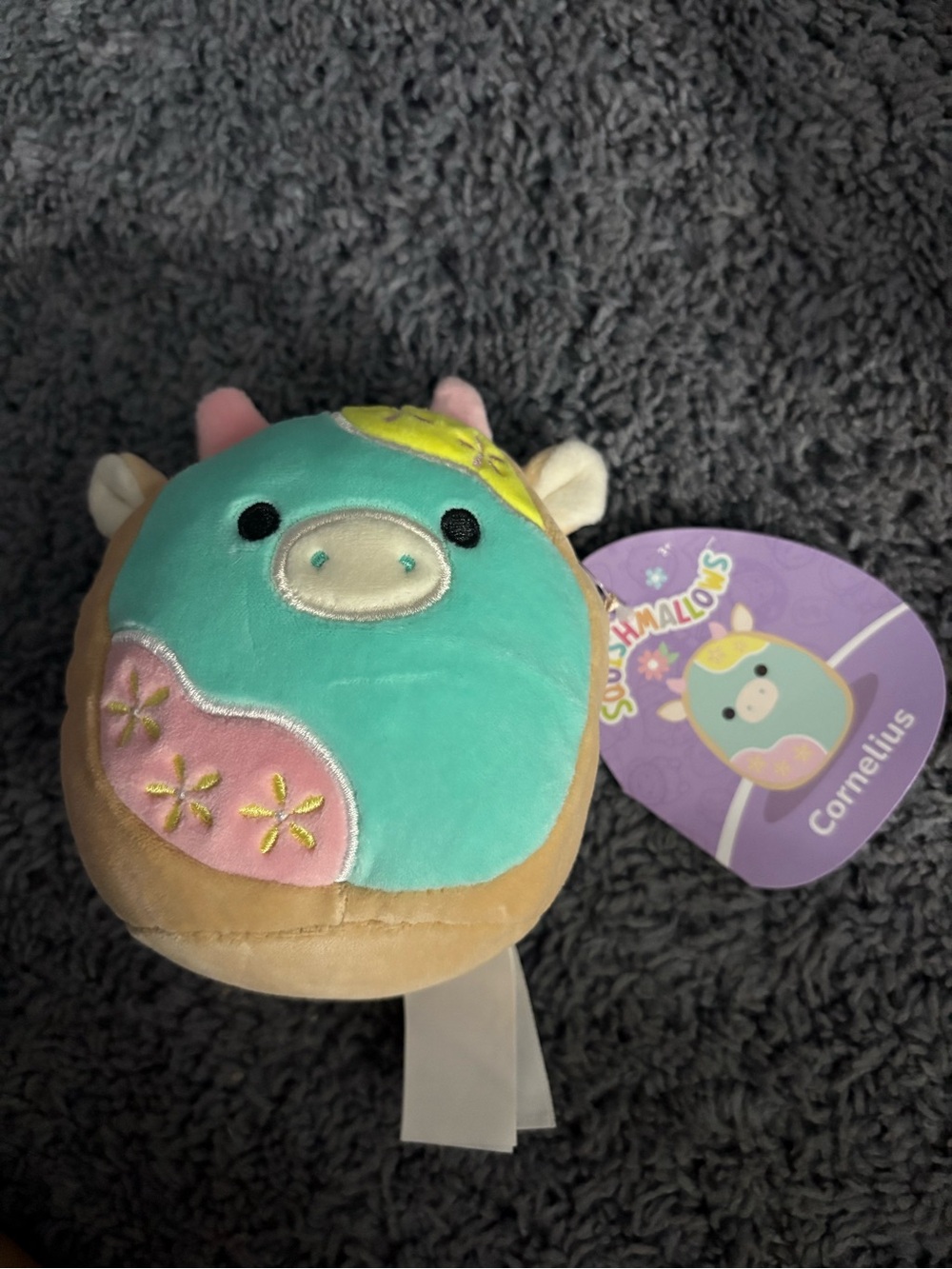 NWT Squishmallows colorful cow whose name is Cornelious